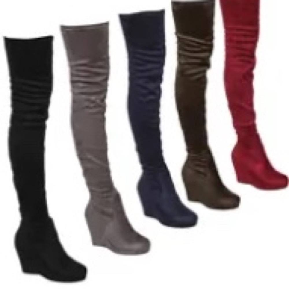Thigh high black wedge boots